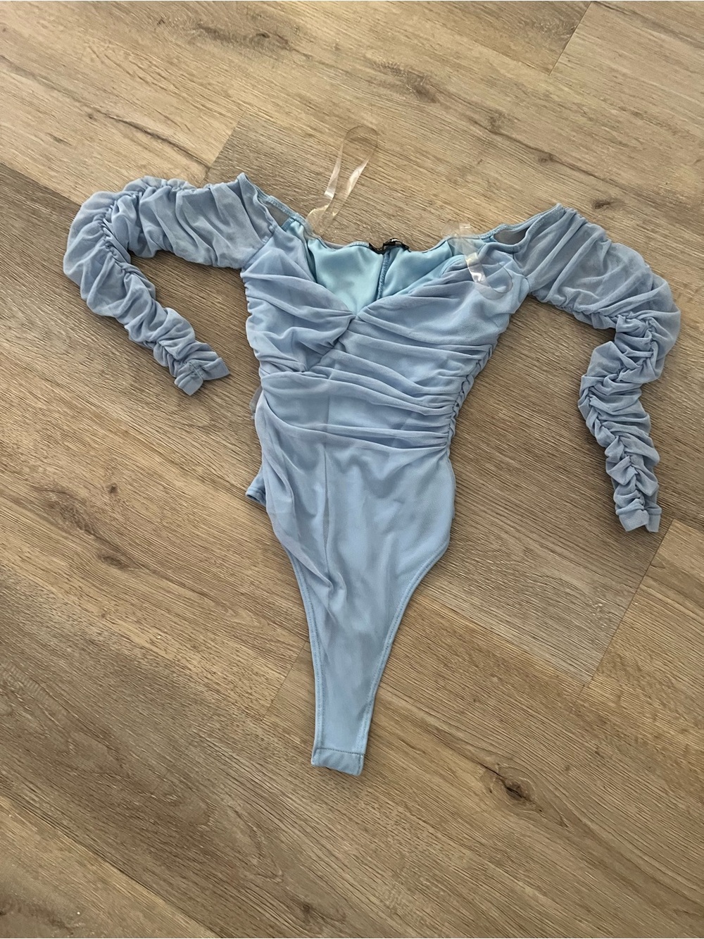 Fashion Nova Light Blue Ruched Long Sleeve Bodysuit